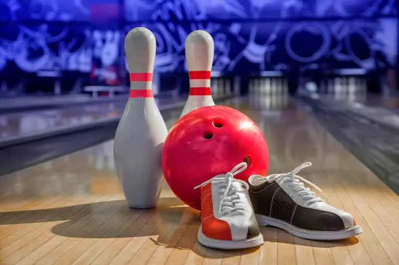 Bowling shoes ball and pins