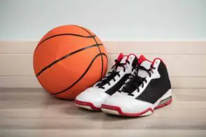 Basketball shoes and ball